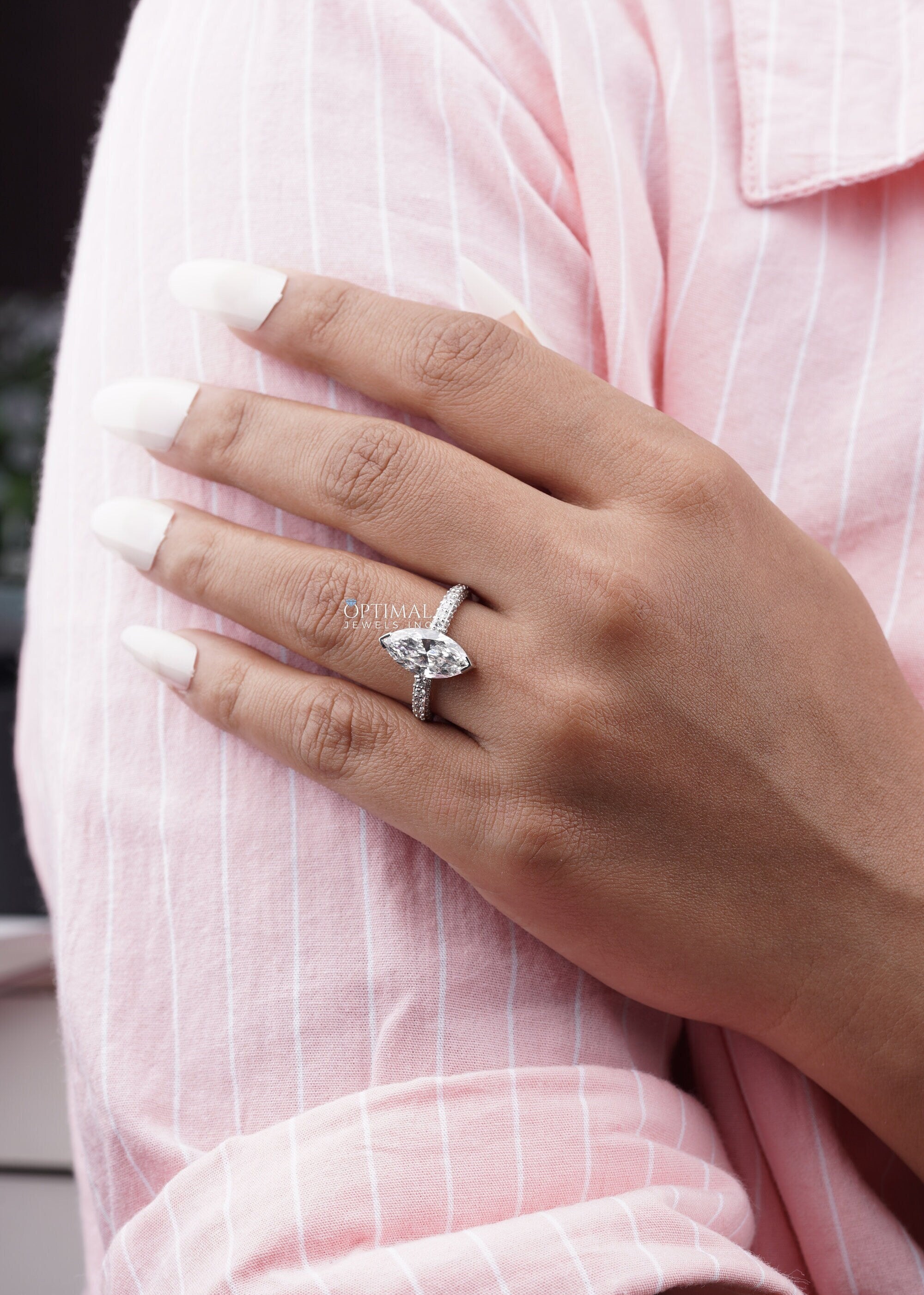 Elegant Marquise Cut Diamond Ring featuring a 2.20 Ctw lab-grown diamond in a pave setting, crafted in white gold.