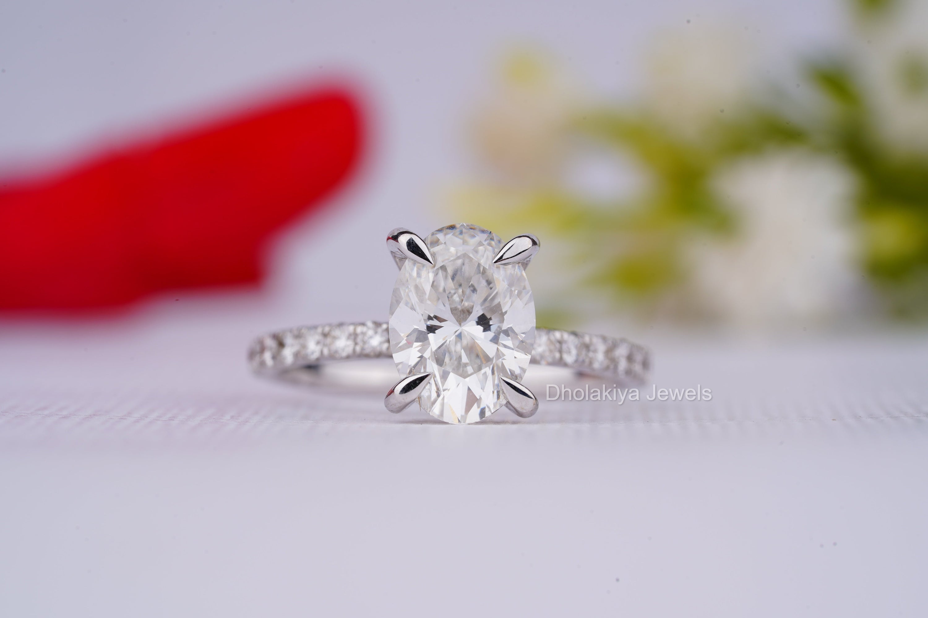 Elegant oval cut engagement ring featuring a 2.50 CT diamond with a classic design, showcasing brilliance and sophistication.