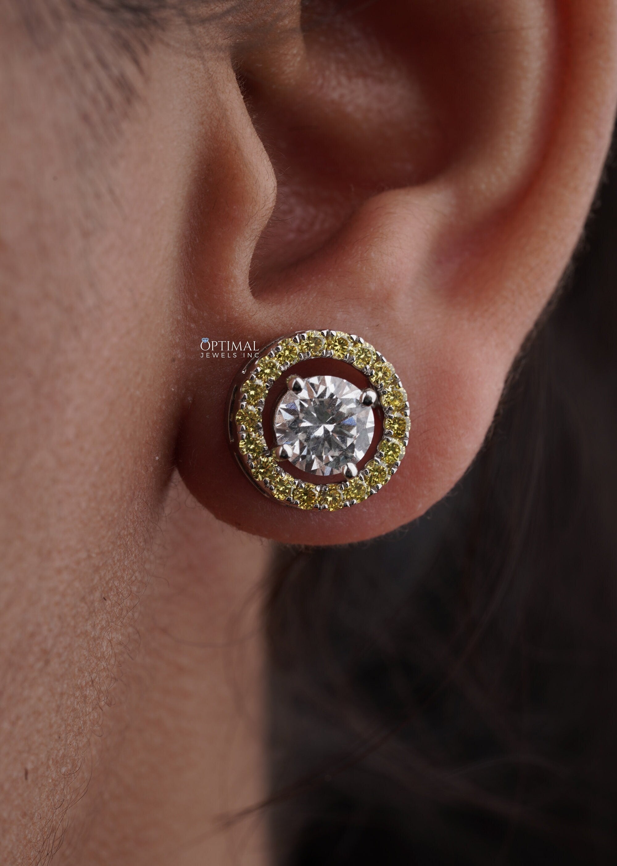 Elegant two-tone lab diamond stud earrings featuring sparkling round diamonds, perfect for special occasions.