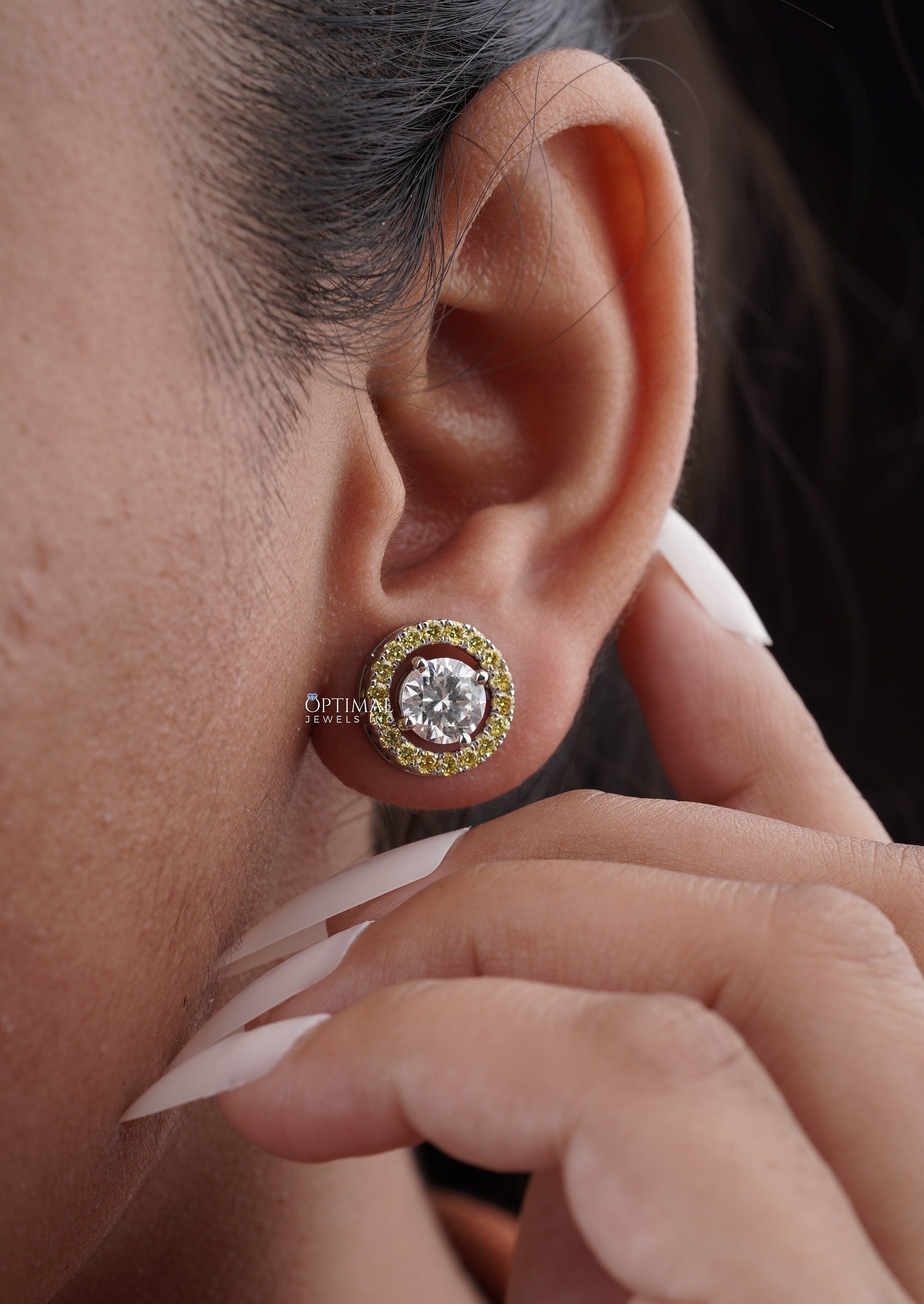 Elegant two-tone lab diamond stud earrings featuring sparkling round diamonds, perfect for special occasions.