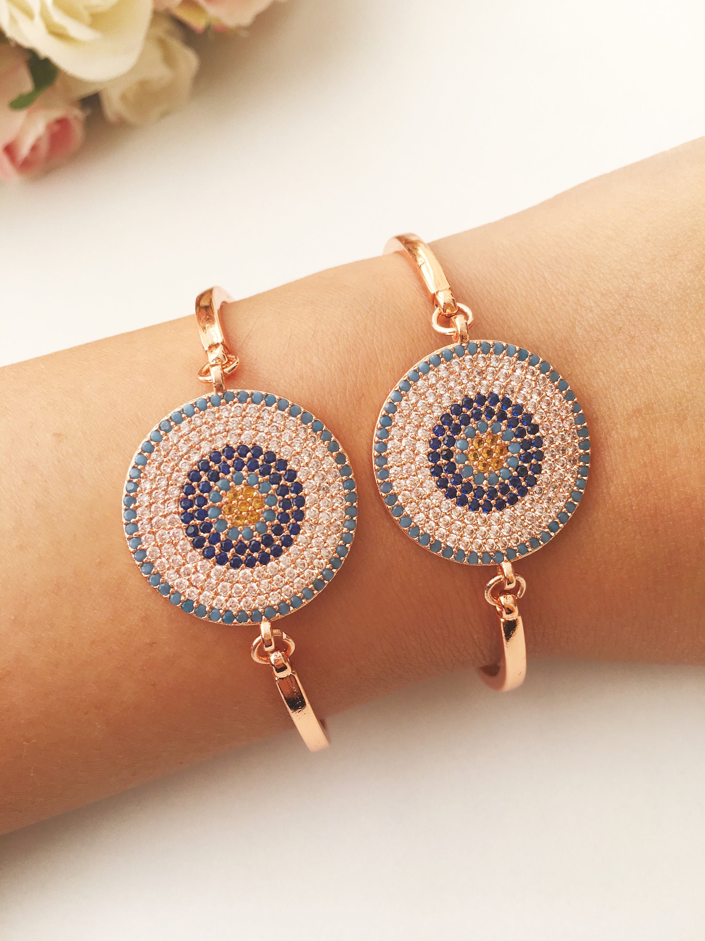 Elegant Zircon Evil Eye Bracelet in rose gold featuring zircon beads and a protective charm, handmade with stainless steel.