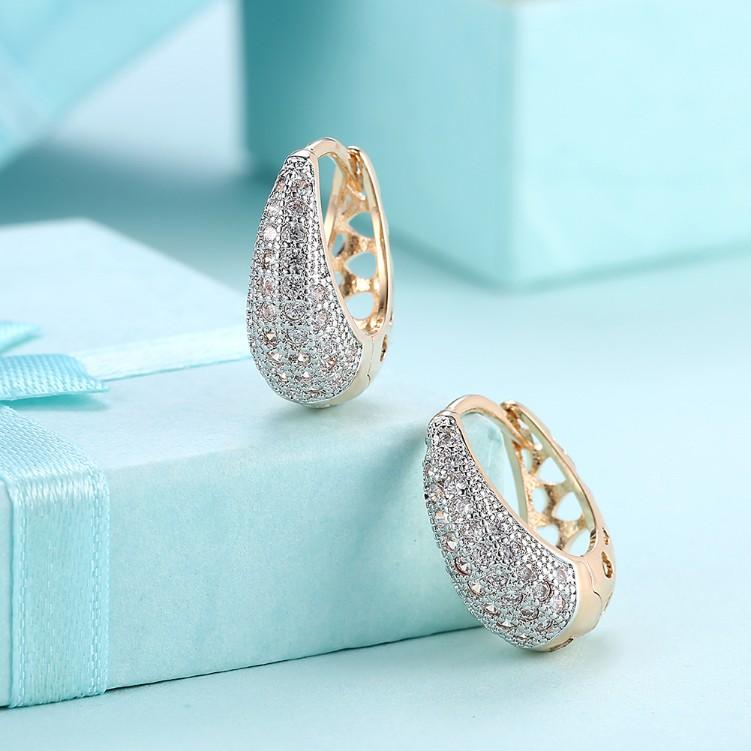 Elements Micro-Pav'e Pear Shaped Teardrop Huggies in 18K Gold, featuring white AAAAA stones and a butterfly backing closure.