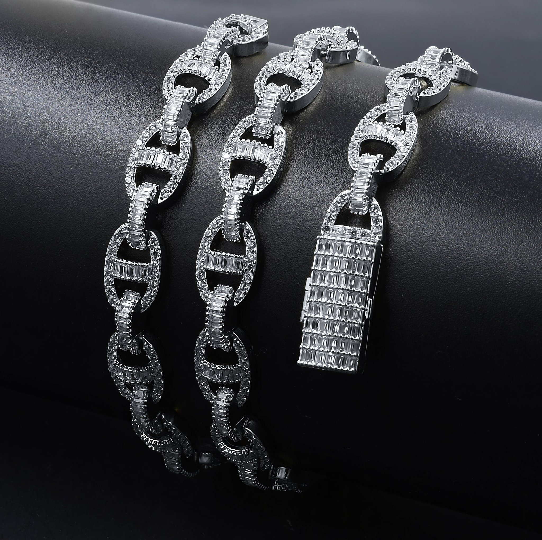ELITE 6MM Iced Out CZ Chain featuring AAA cubic zirconia stones, brass metal, and available in rhodium and gold plating.