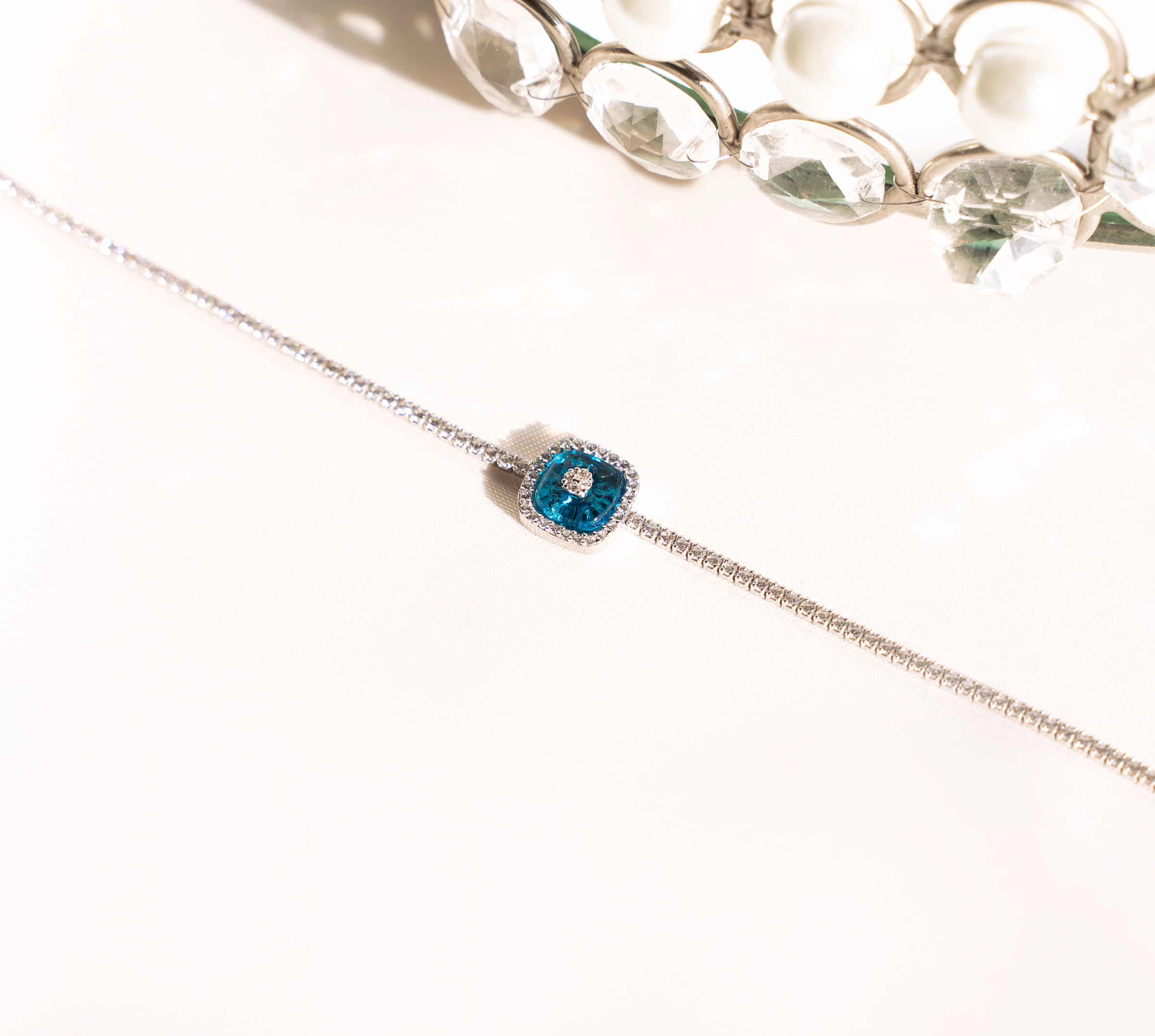 EMEL Tennis Choker featuring sparkling stones and an evil eye pendant, crafted from 925 sterling silver.