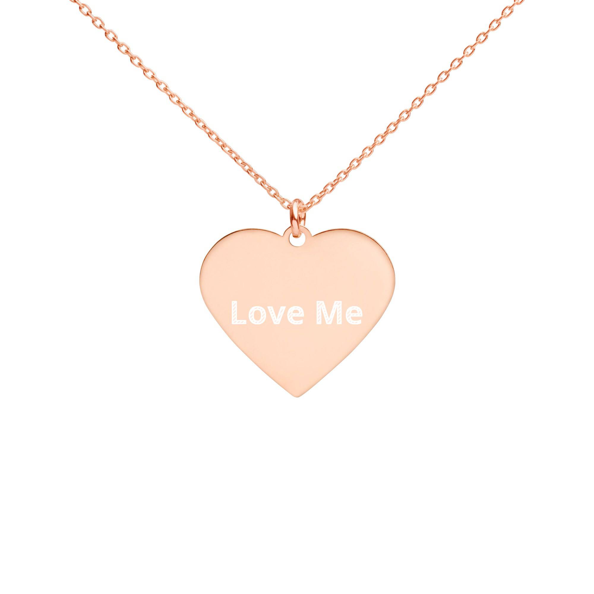 Engraved Silver Heart Necklace featuring a sterling silver heart-shaped pendant on a delicate chain, elegantly displayed in eco-friendly packaging.