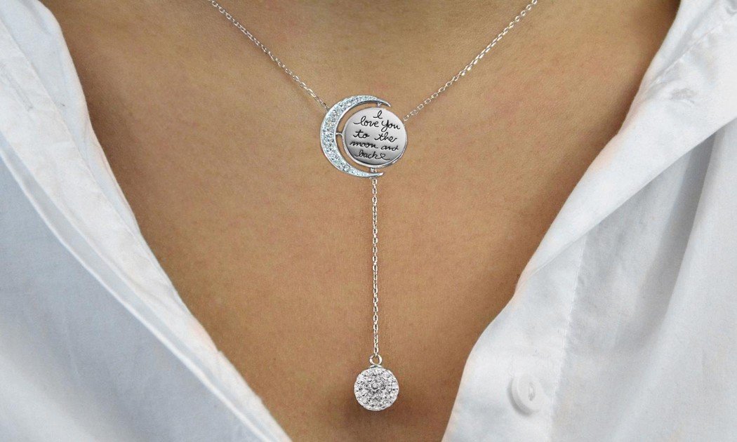 Engraved To The Moon And Back Y Necklace featuring Austrian Elements crystals and white gold plating, elegantly displayed on a soft background.