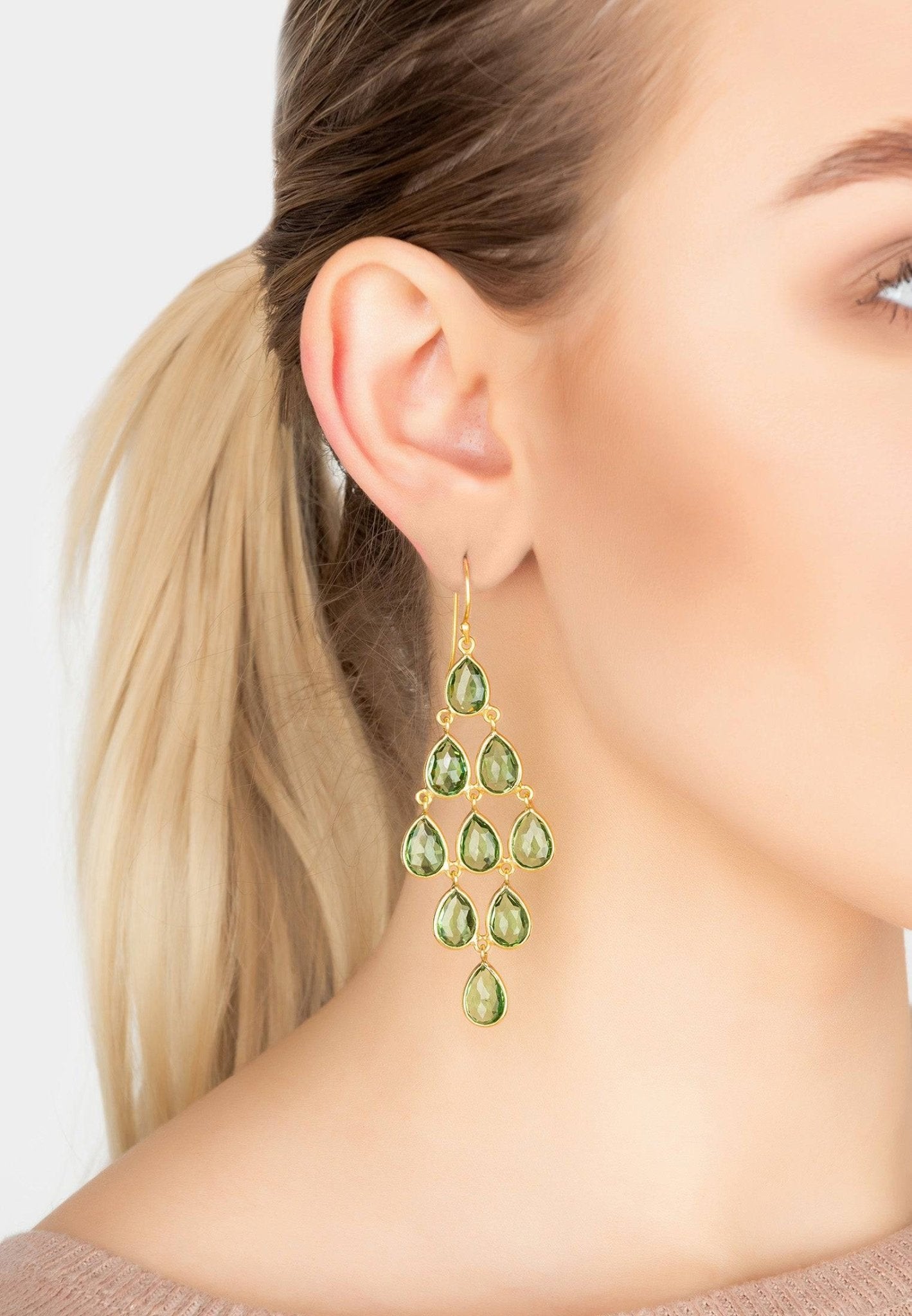 Erviola Gemstone Cascade Earrings featuring gold peridot gemstones in a cascading design, elegantly crafted in 925 sterling silver.