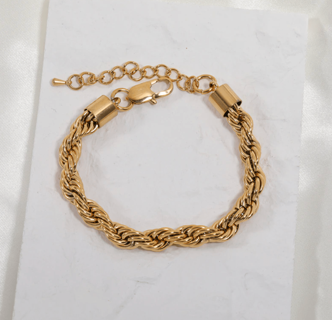 Esmeralda 8mm Twist Bracelet in gold, showcasing a chunky design with a luxurious finish, perfect for any occasion.