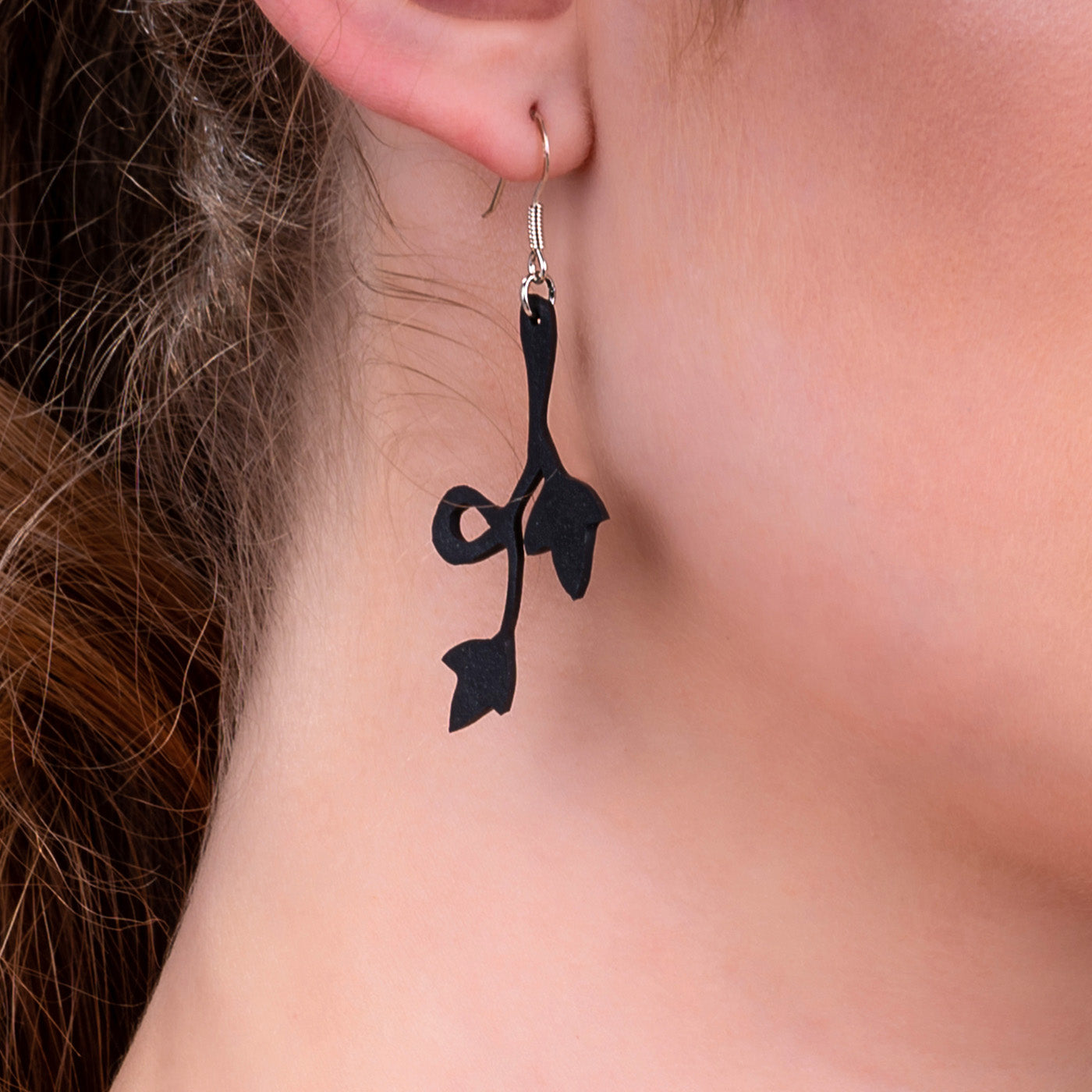 Evelyn Climbing Flower Earrings made from recycled inner tubes, featuring a delicate floral design with silver hooks.