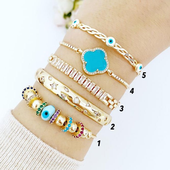 A beautiful handmade Evil Eye Bracelet featuring a blue glass Pandora charm, crafted from tarnish-resistant 316L stainless steel.