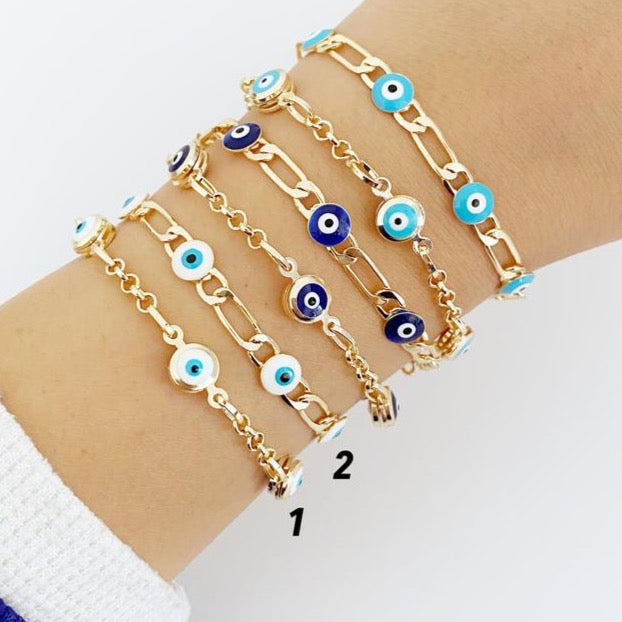 Elegant Evil Eye Bracelet featuring a gold link chain and blue evil eye charms, symbolizing protection and good luck.