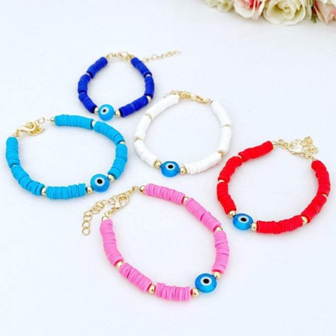 Handmade Evil Eye Bracelet featuring colorful Heishi vinyl polymer clay disc beads, perfect for summer stacking.
