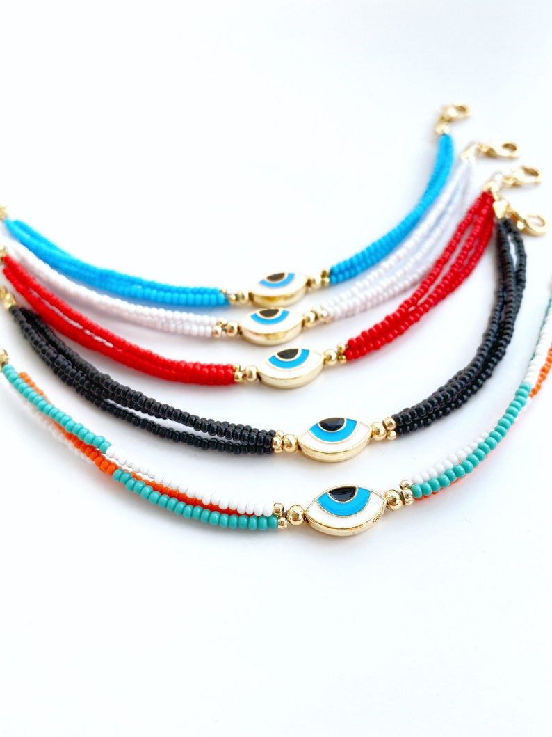 Handmade Evil Eye Bracelet featuring Miyuki seed beads and a brass evil eye charm, adjustable size for comfort.