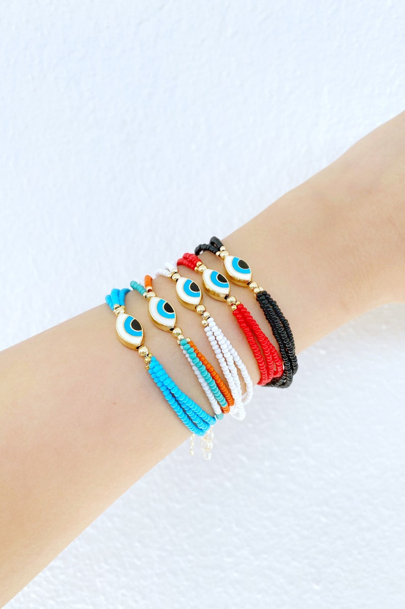 Handmade Evil Eye Bracelet featuring Miyuki seed beads and a brass evil eye charm, adjustable size for comfort.