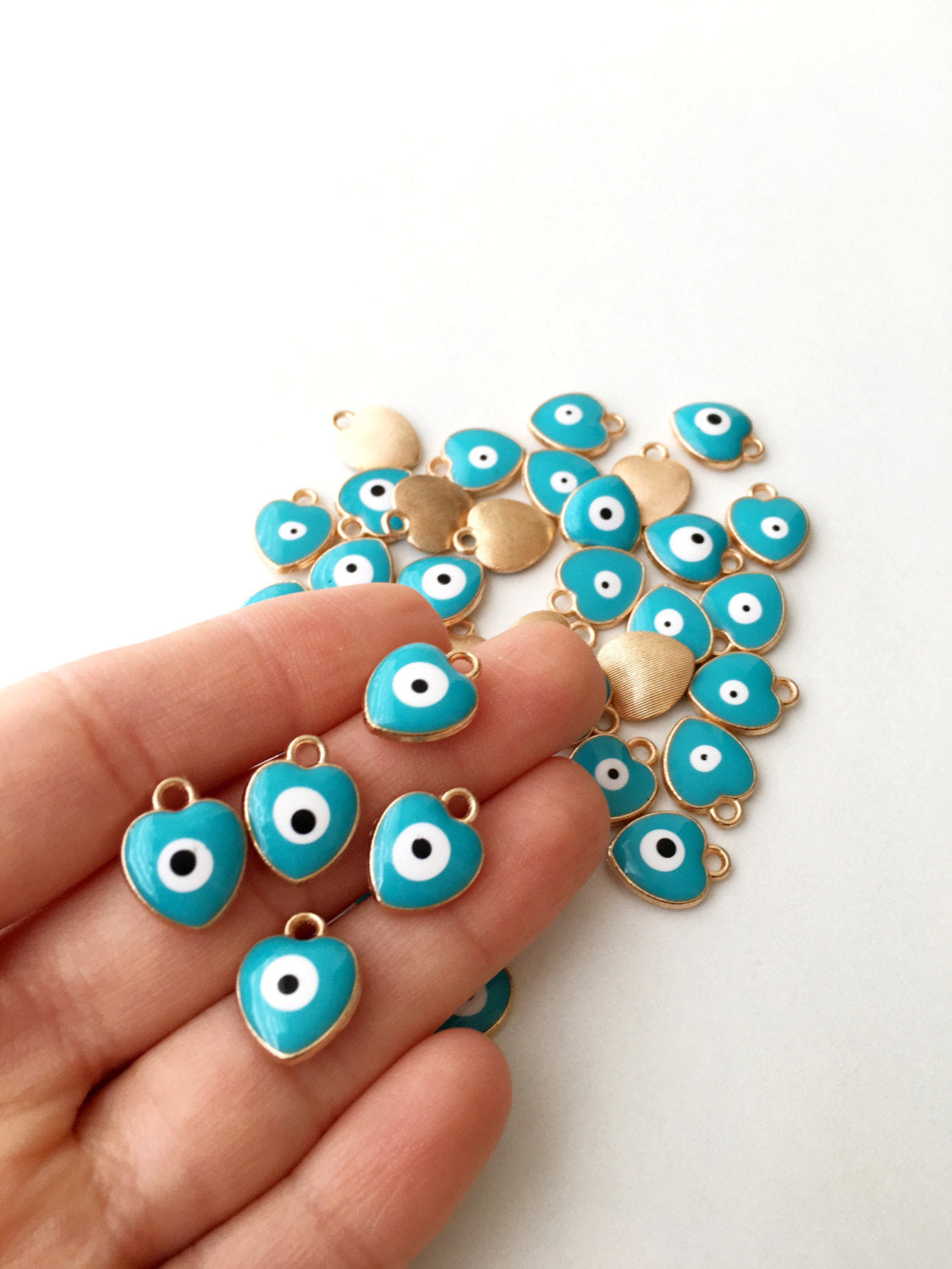 Set of 5 gold plated evil eye charms in various colors, featuring enamel finish and 2mm hole for easy threading.