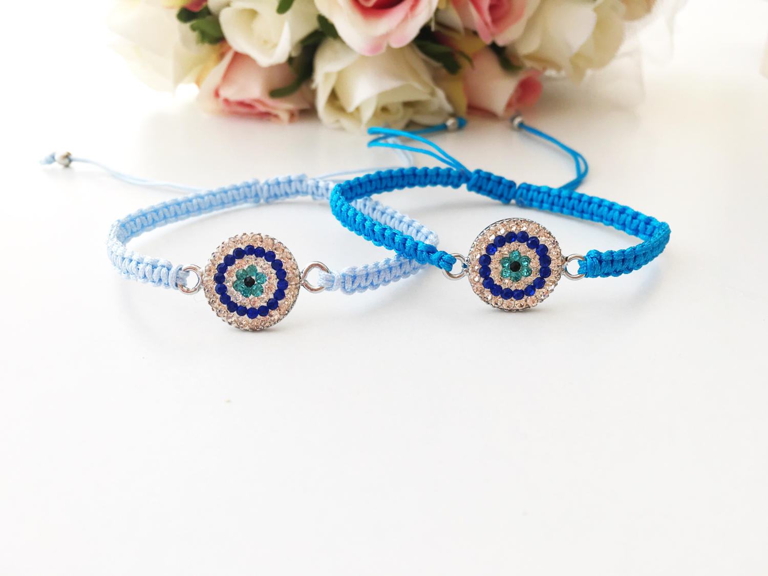 Handmade Evil Eye Charm Bracelet featuring blue macrame and zircon charm, symbolizing protection and style.