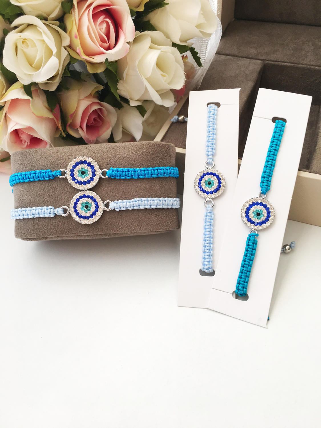 Handmade Evil Eye Charm Bracelet featuring blue macrame and zircon charm, symbolizing protection and style.