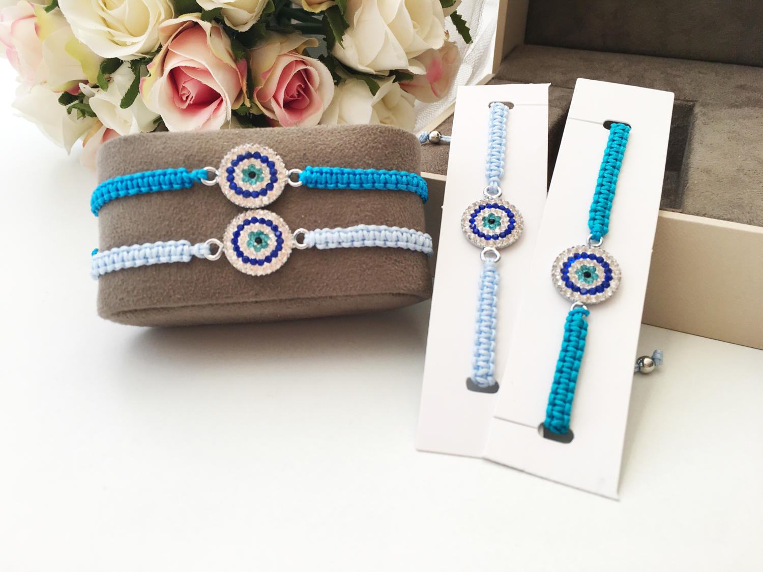 Handmade Evil Eye Charm Bracelet featuring blue macrame and zircon charm, symbolizing protection and style.