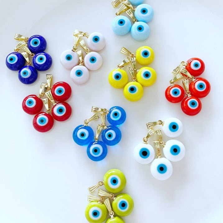 Five handmade Murano glass beads featuring colorful evil eye designs, perfect for jewelry making.