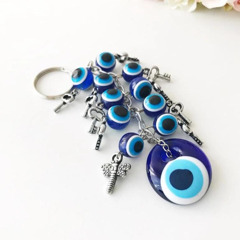 A beautifully crafted evil eye protection keychain featuring a vibrant blue eye design, symbolizing protection and good luck.