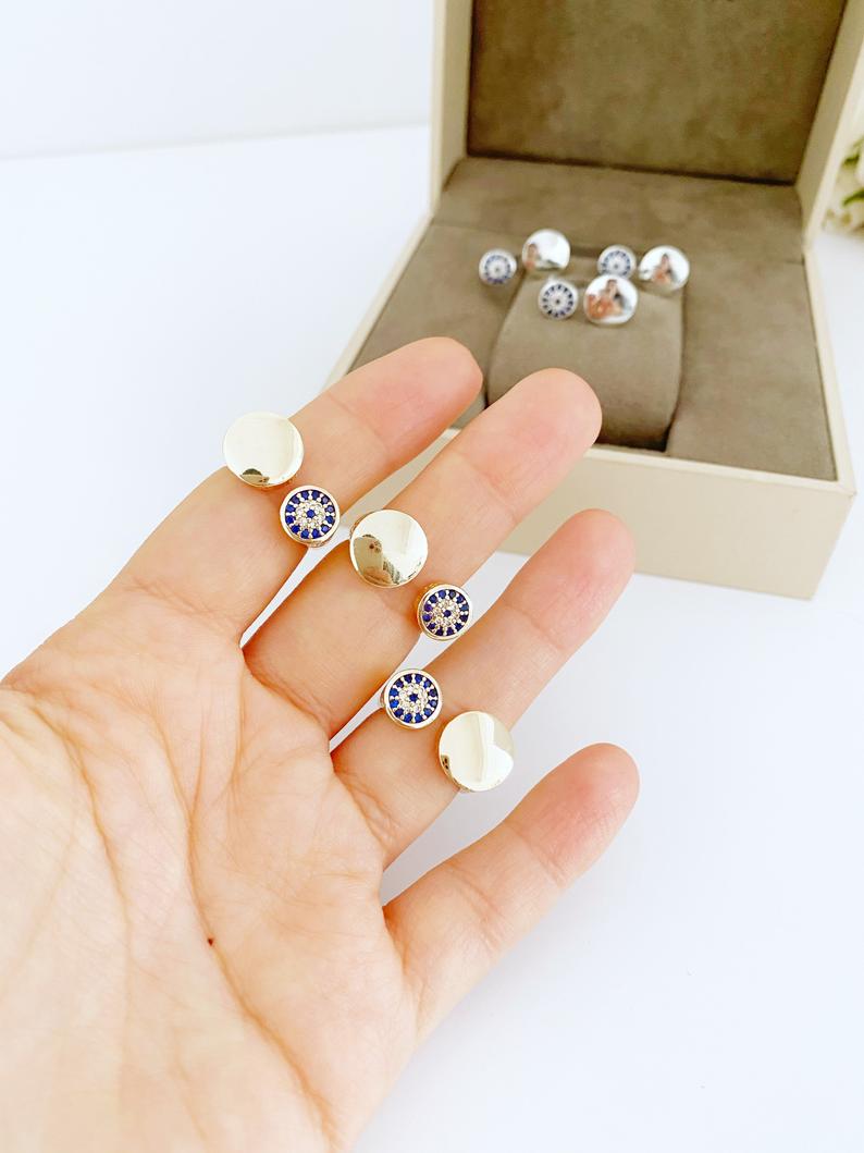 Adjustable Evil Eye Ring featuring a zircon charm on a gold or silver band, showcasing a protective symbol in a stylish design.