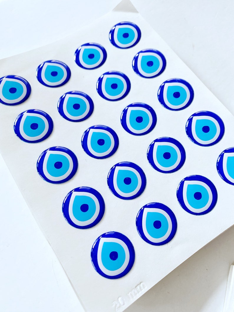 Evil Eye Sticker Pack featuring various sizes of embossed Turkish Evil Eye stickers on a colorful background.