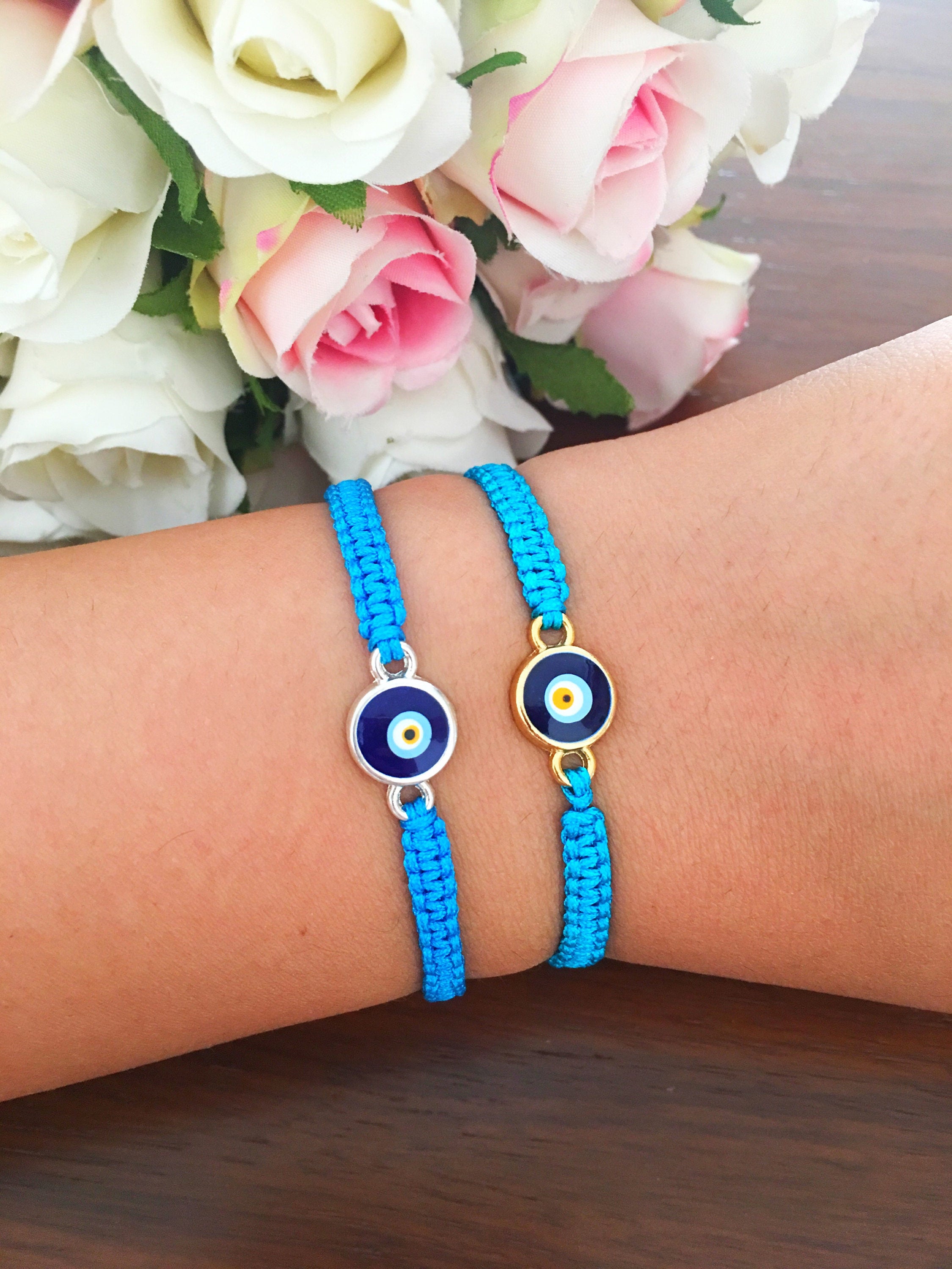 Handmade Evil Eye String Bracelet featuring turquoise macrame and an adjustable design with a protective charm.