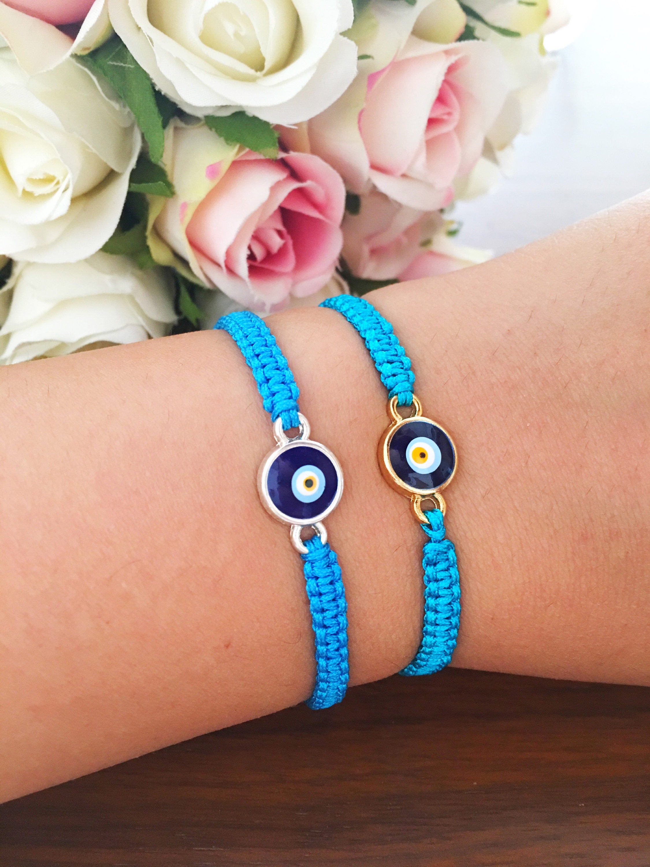 Handmade Evil Eye String Bracelet featuring turquoise macrame and an adjustable design with a protective charm.
