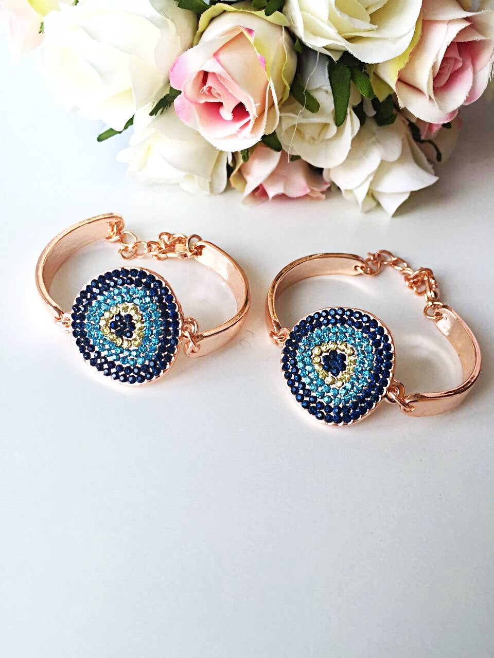 Handmade Evil Eye Zircon Bracelet featuring a rose gold chain and sparkling zirconia stones, symbolizing protection and good luck.
