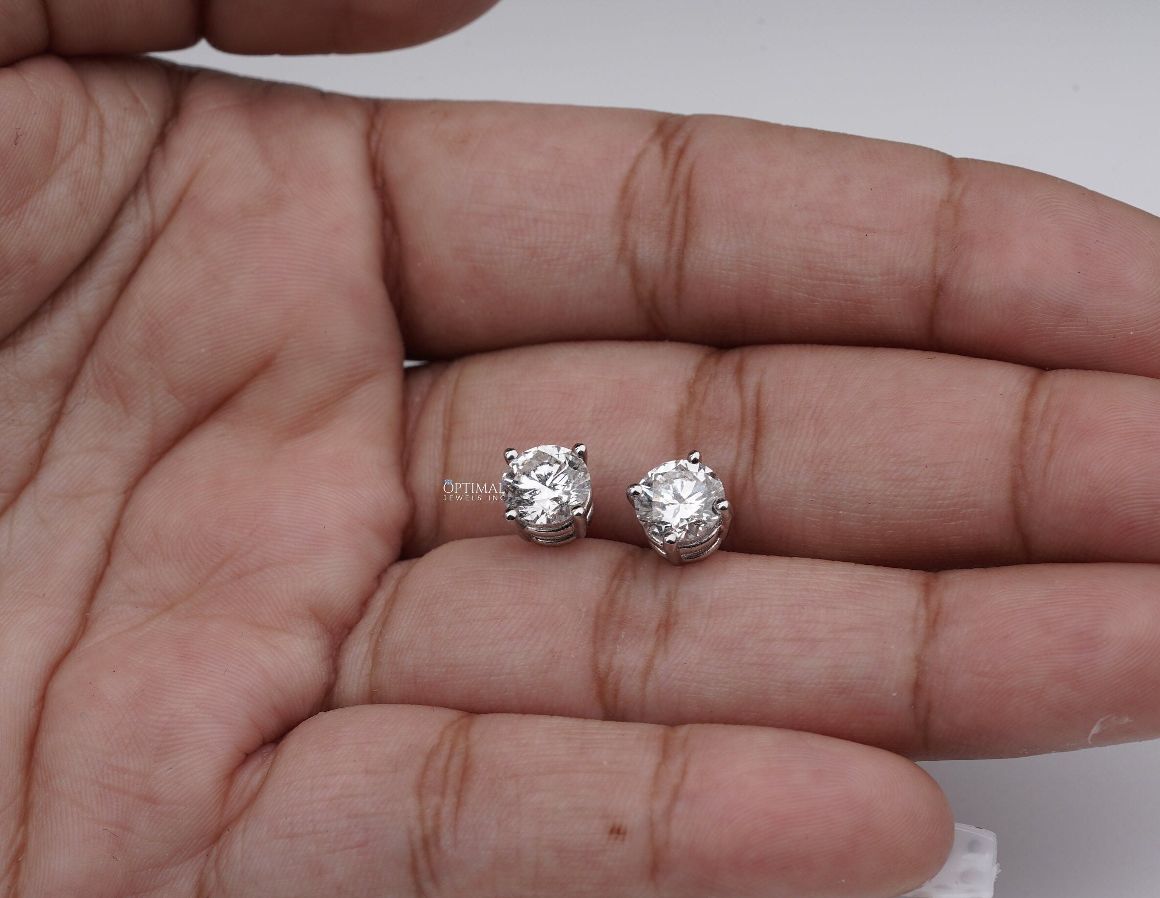 Exquisite Diamond Stud Earring featuring 2.44 Ctw of brilliant lab-grown diamonds in a halo circle drop design, set in 18K white gold.