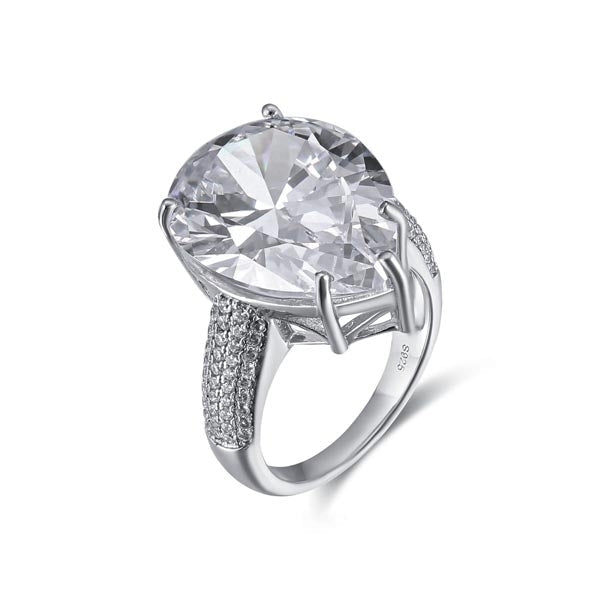 An extraordinary white sapphire engagement ring featuring a pear-shaped stone set in 925 sterling silver with a real white gold finish.