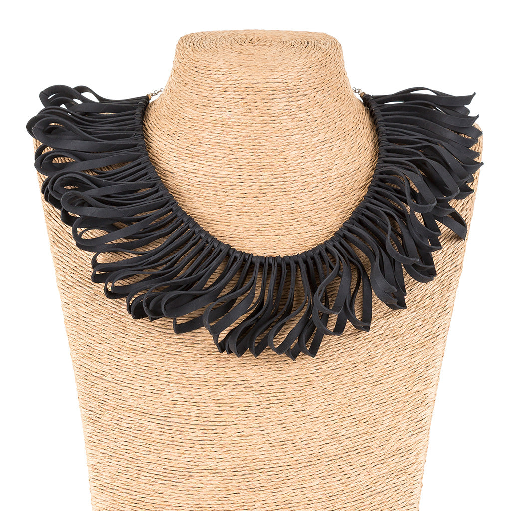 Fay Handcrafted Avant Garde Necklace made from reclaimed bicycle inner tubes, featuring a unique fanned design with individual loops.