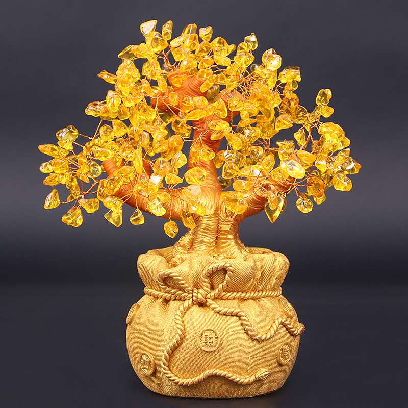 A beautiful Feng Shui Citrine Money Tree with crystal leaves growing from a golden money bag, symbolizing wealth and abundance.