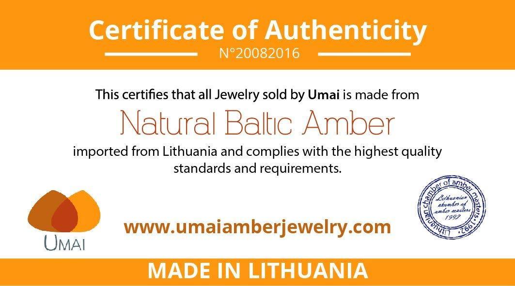 Handcrafted Fertility Amber Bracelet featuring raw Baltic amber and various gemstones for enhancing fertility and emotional balance.