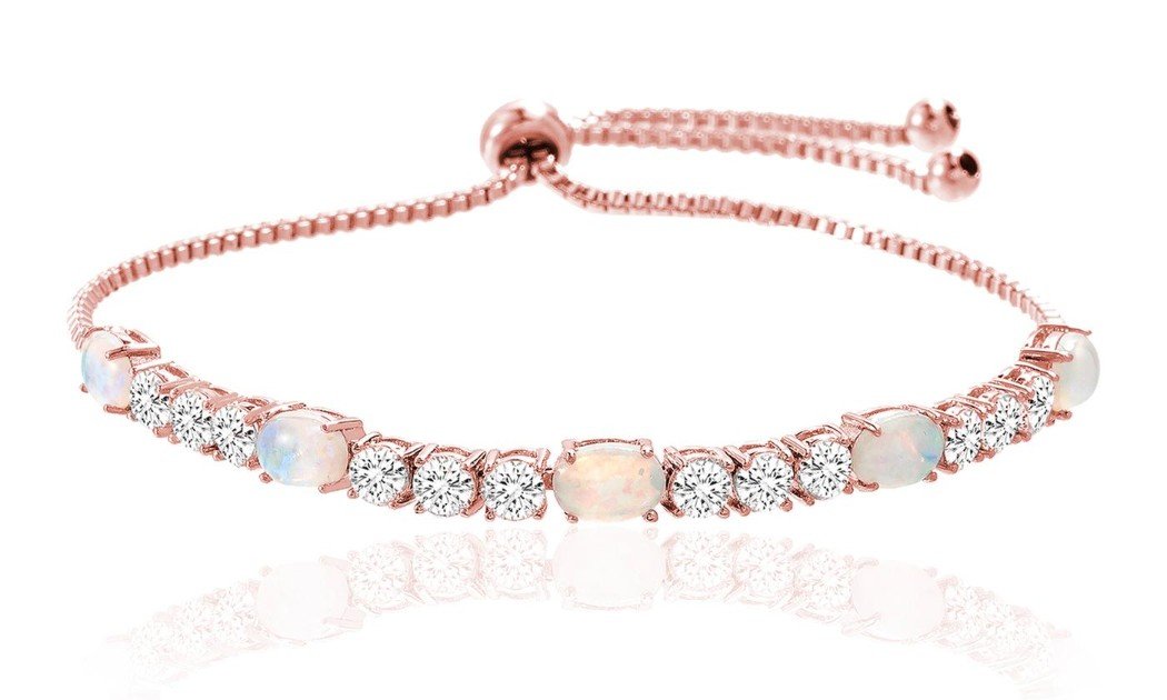 Fiery Opal Tennis Bracelet featuring five opal crystals set in rose gold plating, adjustable length, and a slider lock clasp.