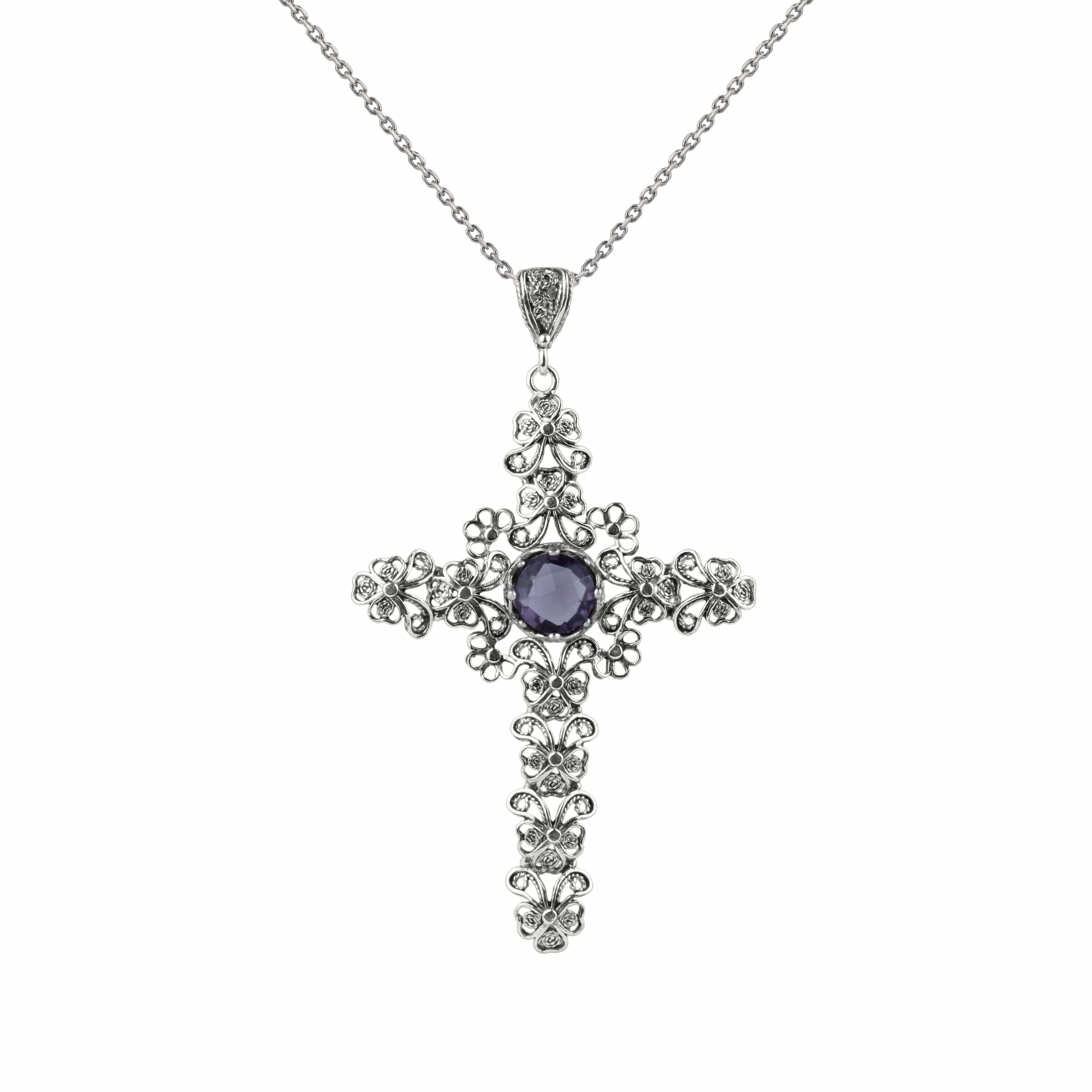 Sterling silver filigree cross pendant featuring a round cut 6mm amethyst gemstone, elegantly designed for women.