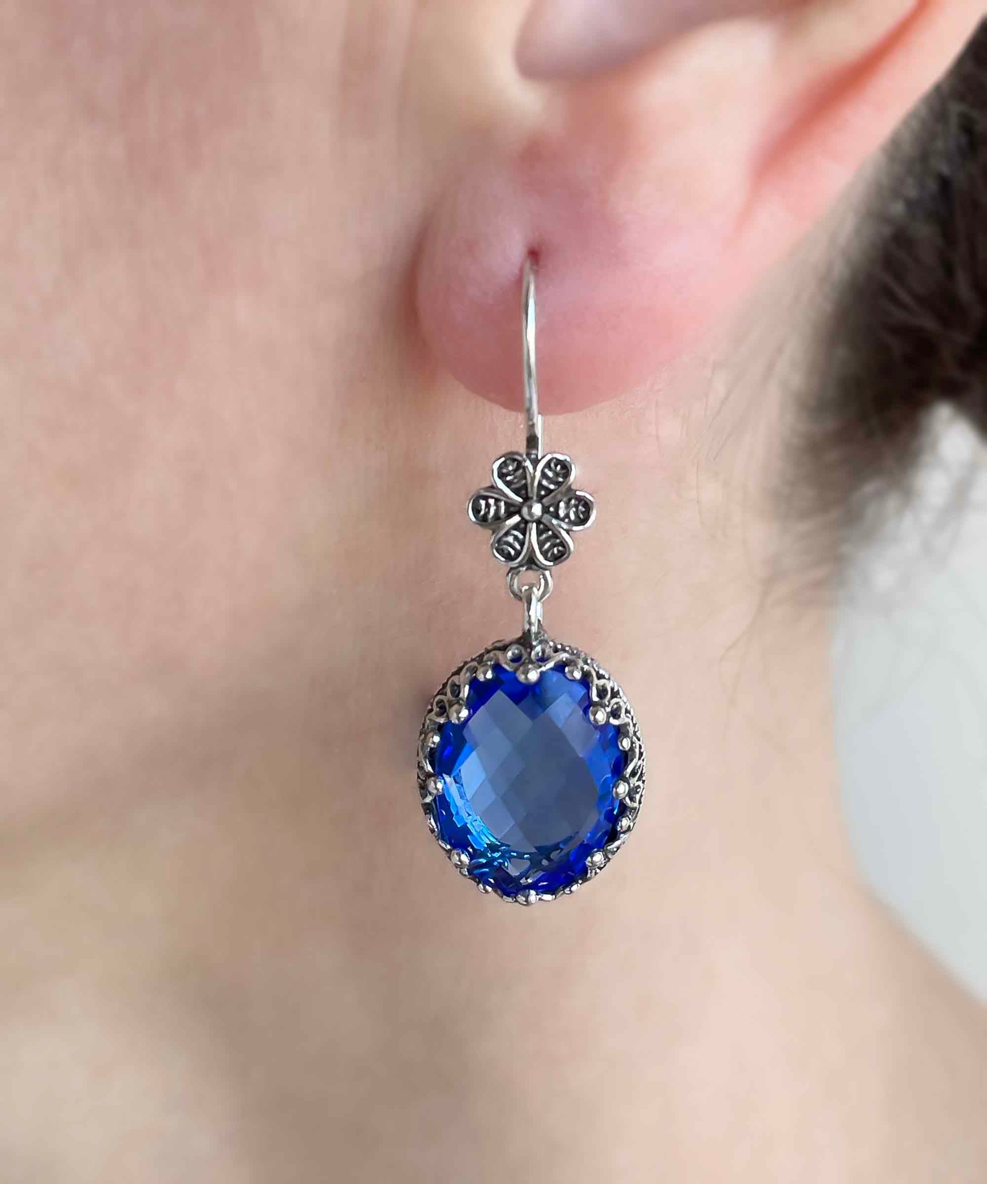 Elegant Filigree Art Blue Quartz Gemstone Dangle Earrings in 925 sterling silver, showcasing intricate designs and vibrant gemstones.