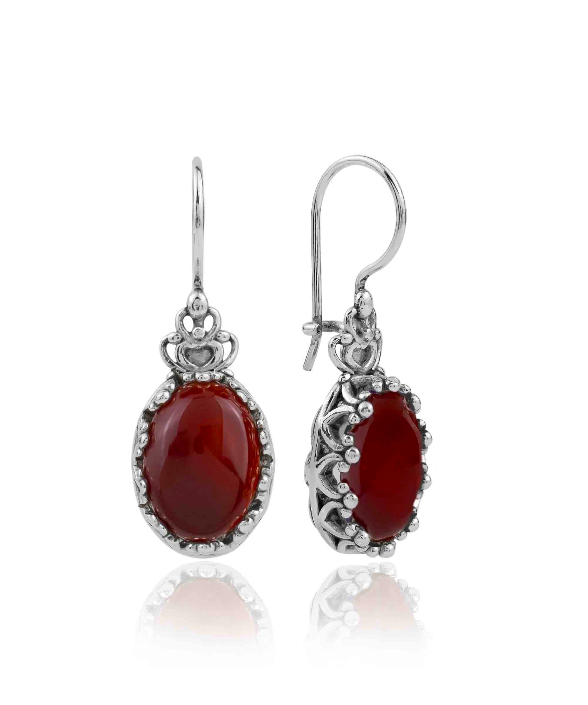 Elegant Filigree Art Carnelian Gemstone Crown Earrings in sterling silver, featuring intricate design and warm reddish-orange gemstone.
