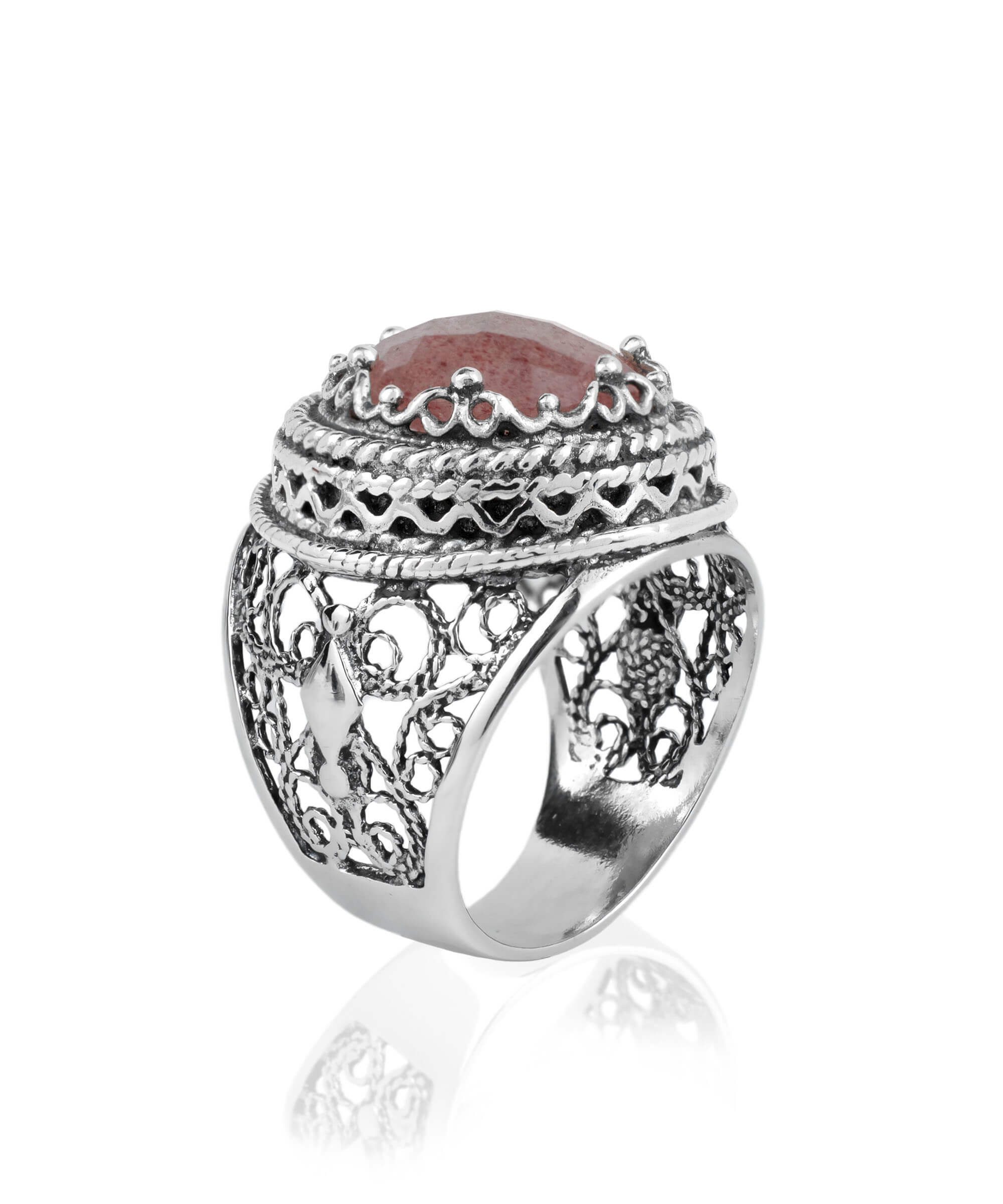 A stunning sterling silver bold ring featuring a cherry quartz gemstone with intricate filigree art design, showcasing a blend of traditional and modern craftsmanship.