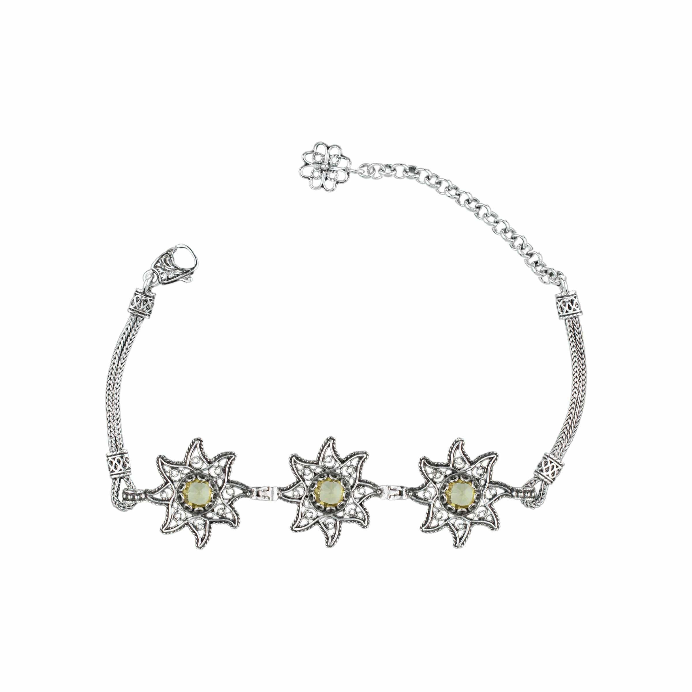 Elegant sterling silver filigree bracelet featuring a vibrant citrine gemstone in a star design, perfect for women.