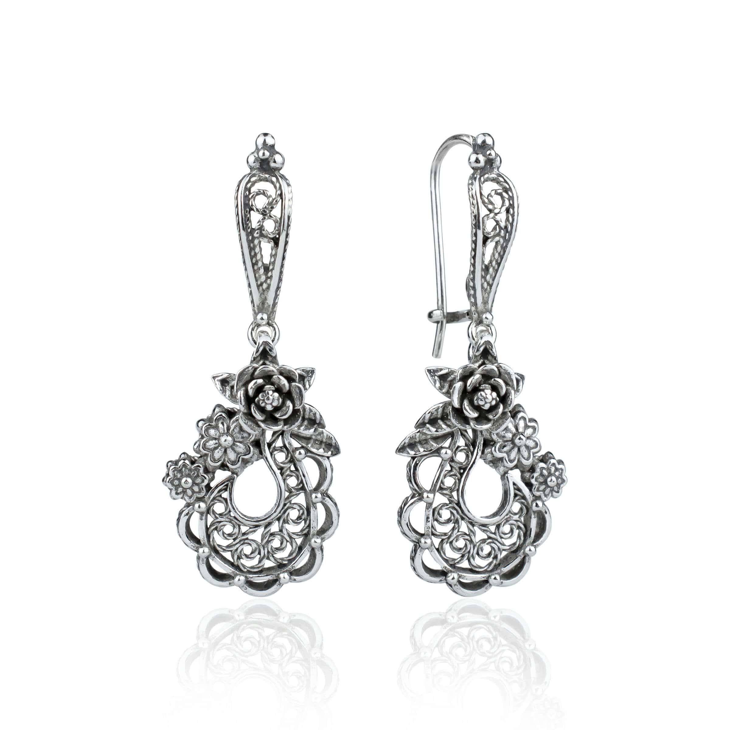 Handmade sterling silver dangle earrings featuring a filigree bucket of flowers design, showcasing intricate detailing and an antique-inspired finish.