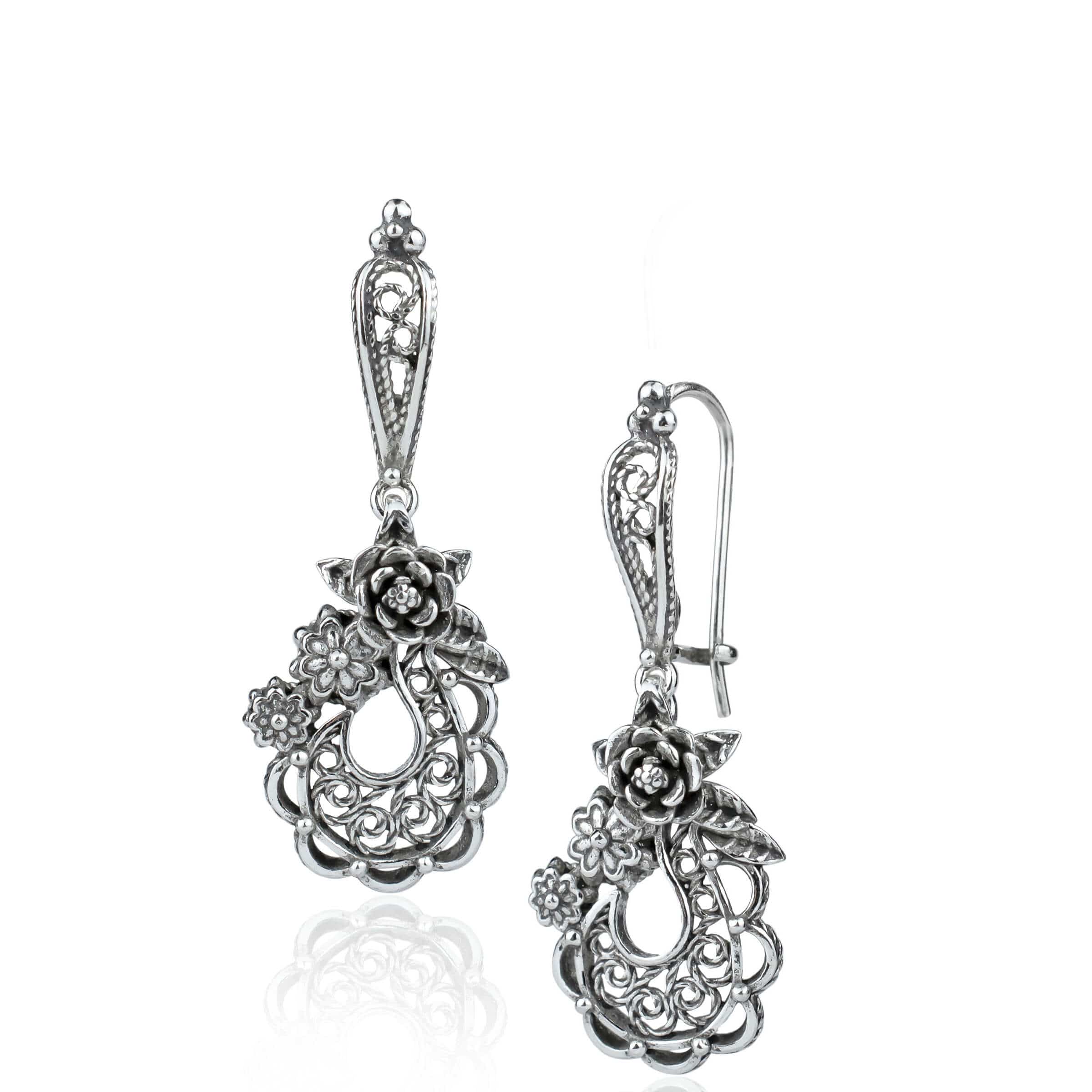 Handmade sterling silver dangle earrings featuring a filigree bucket of flowers design, showcasing intricate detailing and an antique-inspired finish.