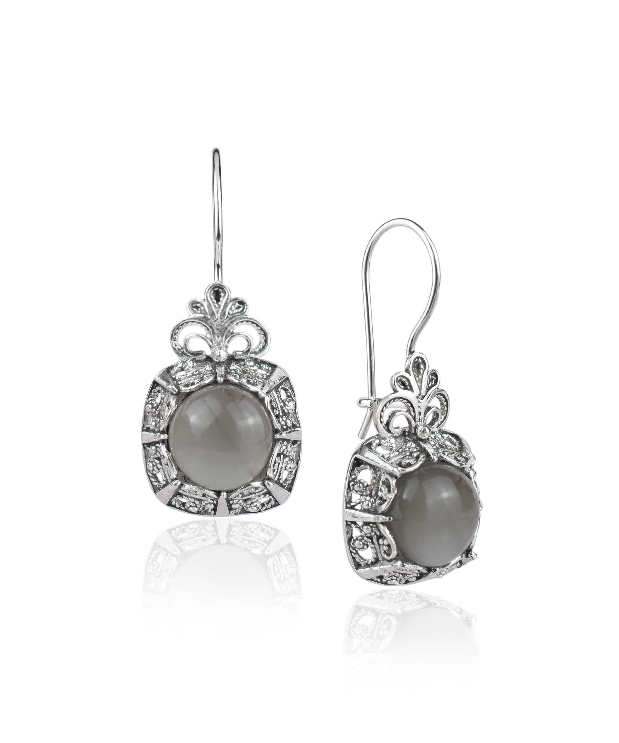 Elegant handmade silver drop earrings featuring intricate filigree design and gray moonstone gemstone.