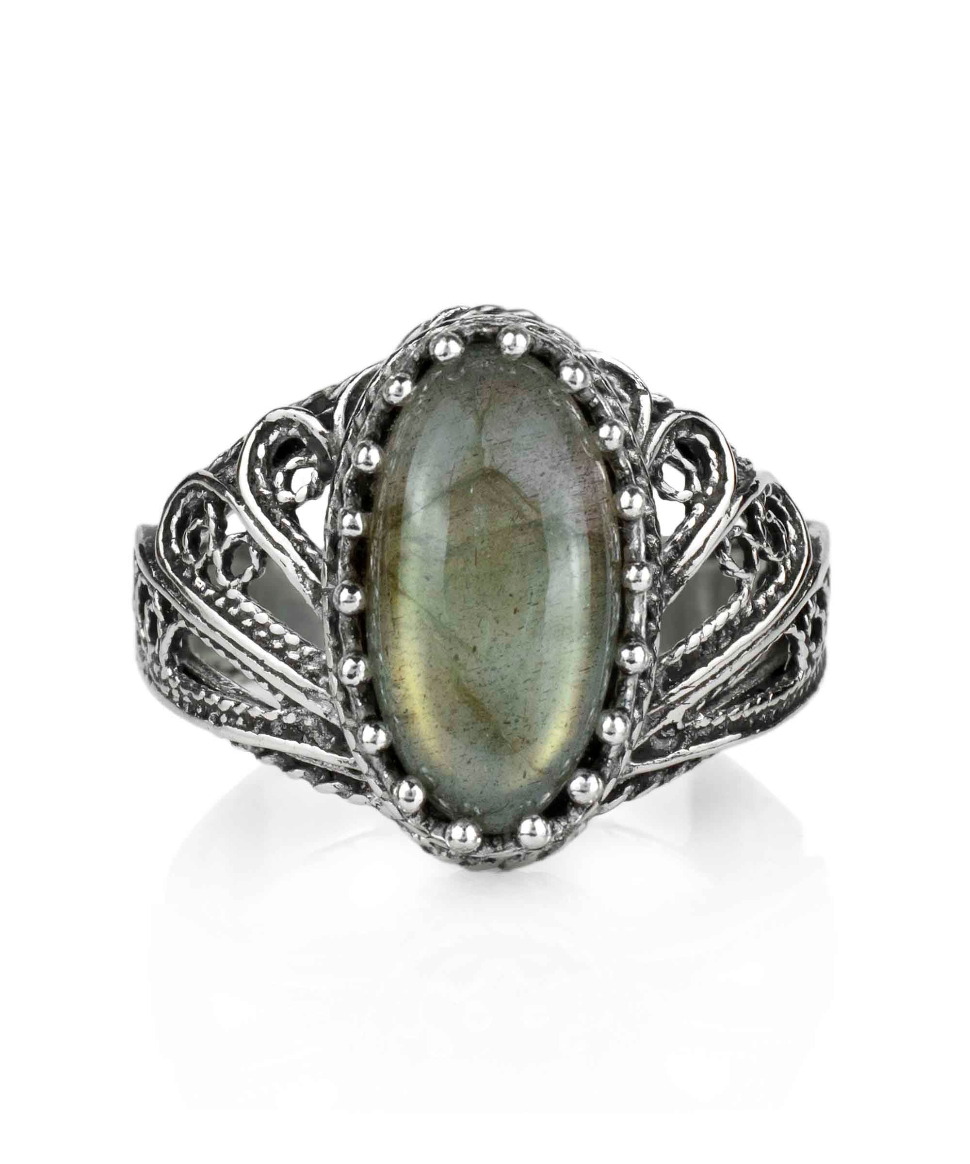 Elegant silver cocktail ring featuring a labradorite gemstone in an angel wings filigree design, crafted from 925 sterling silver.