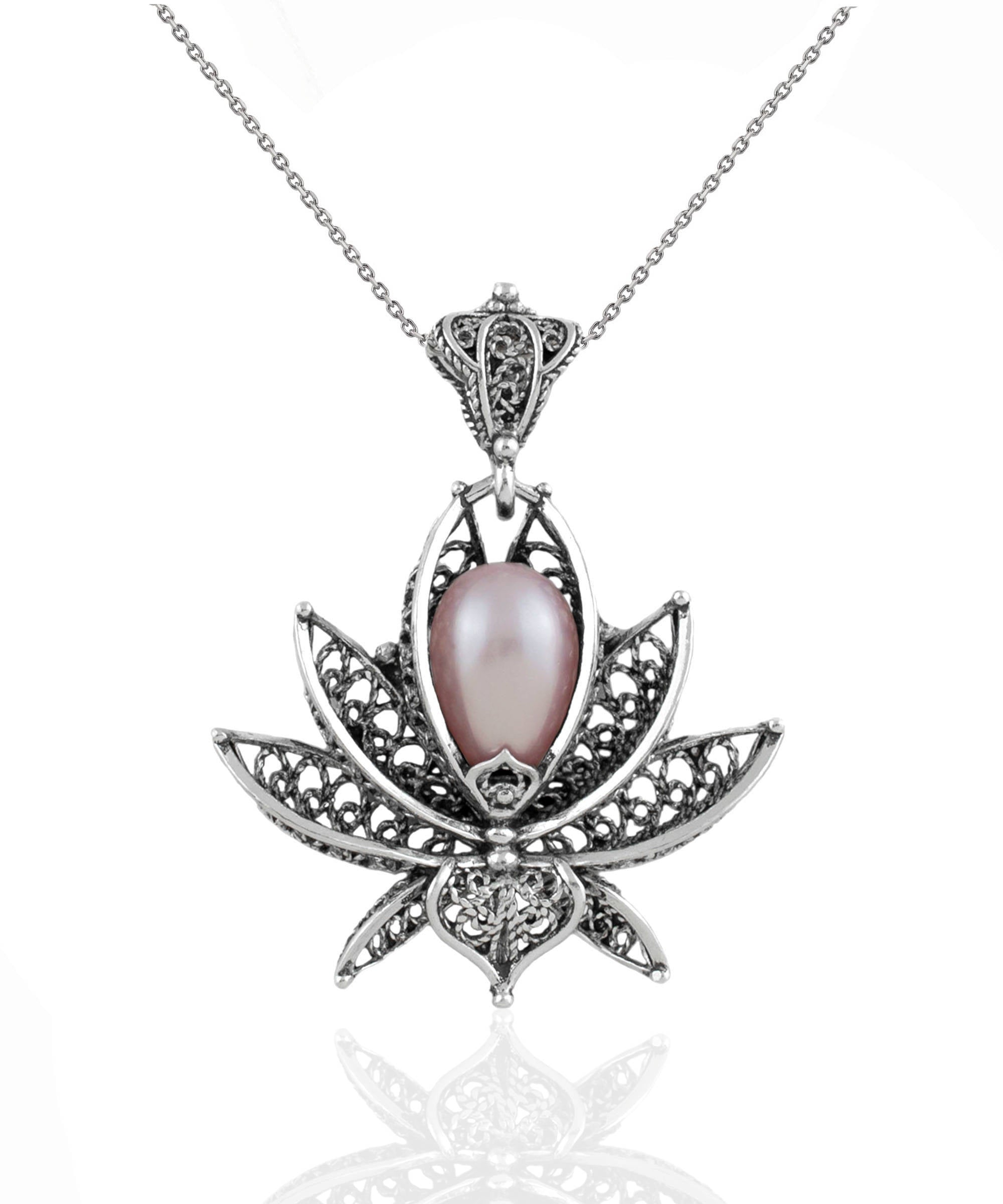 Elegant 3D lotus flower pendant featuring a pink pearl, crafted from 925 Sterling Silver with intricate filigree details.