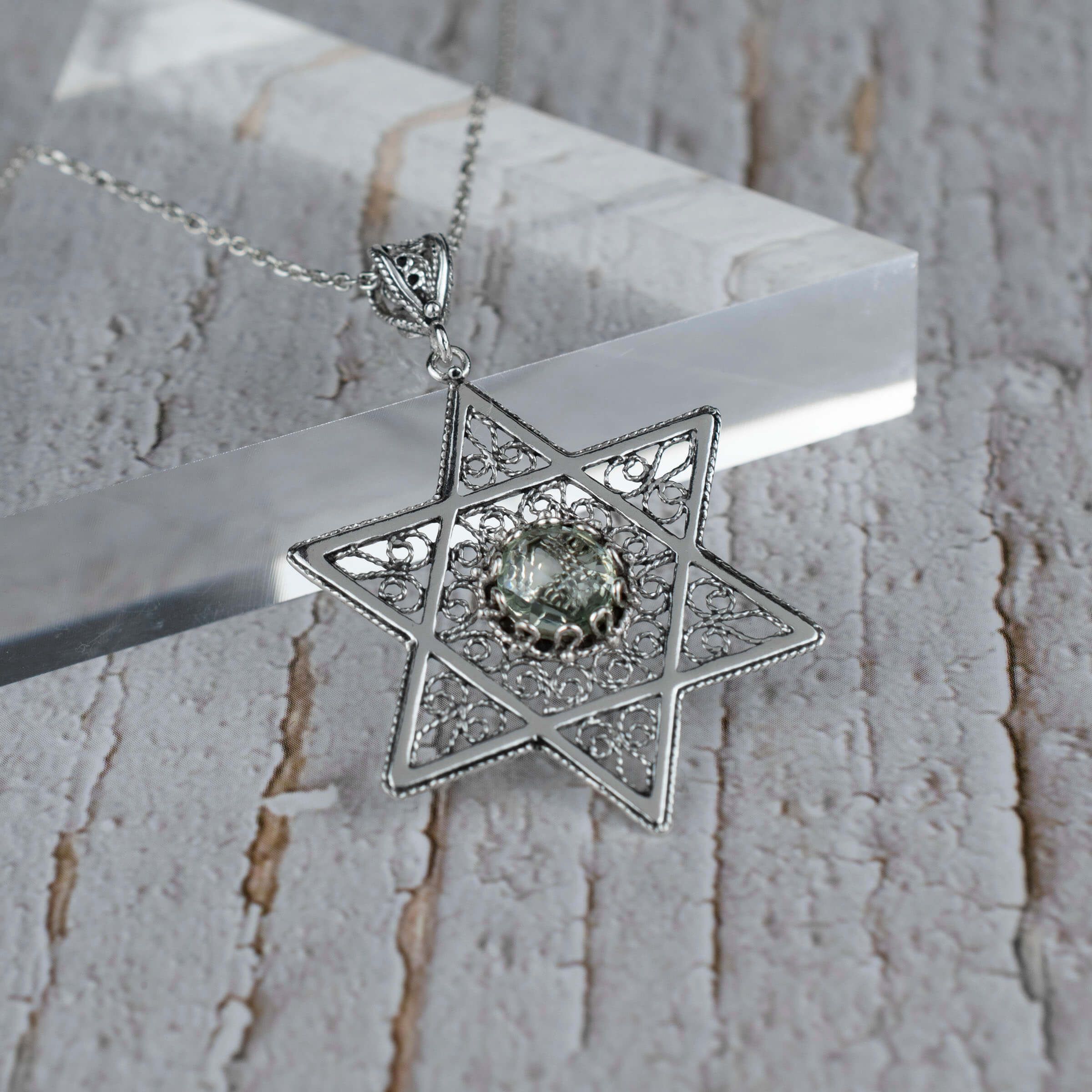 Sterling silver filigree art pendant featuring a prasiolite gemstone in the shape of a Star of David, elegantly designed for women.