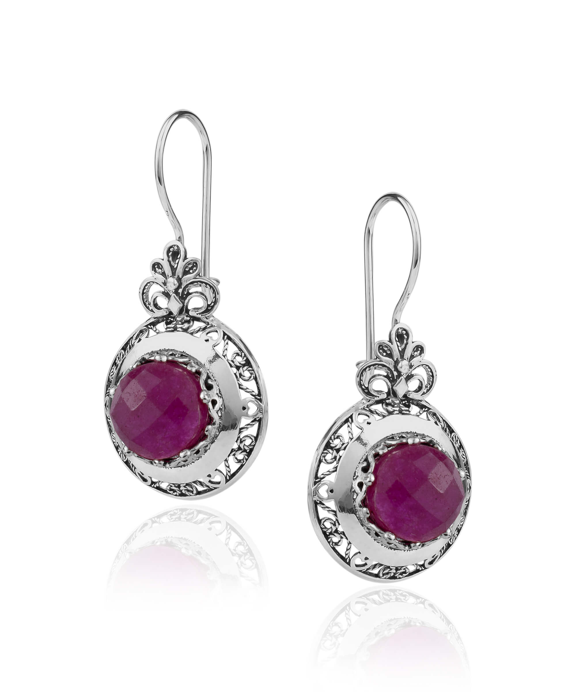 Elegant silver drop earrings featuring filigree art and ruby corundum gemstone in floral design.