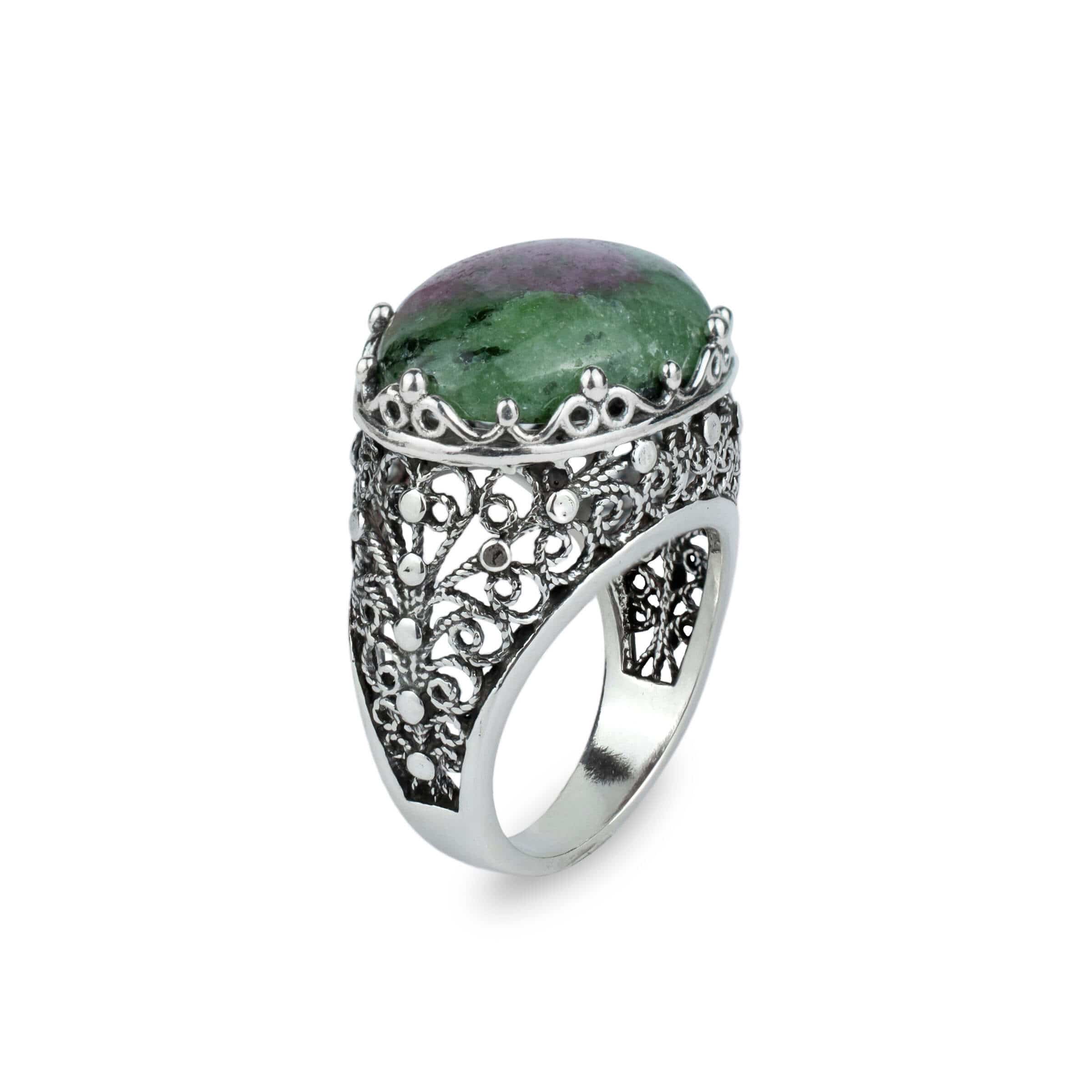 Handmade silver dome statement ring featuring a stunning ruby zoisite gemstone with intricate filigree design.