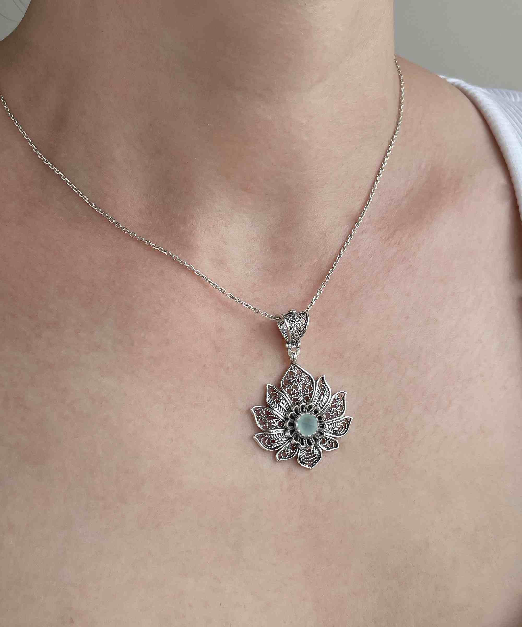Handcrafted 925 Sterling Silver lotus flower pendant necklace with aqua chalcedony gemstone, featuring intricate filigree details.
