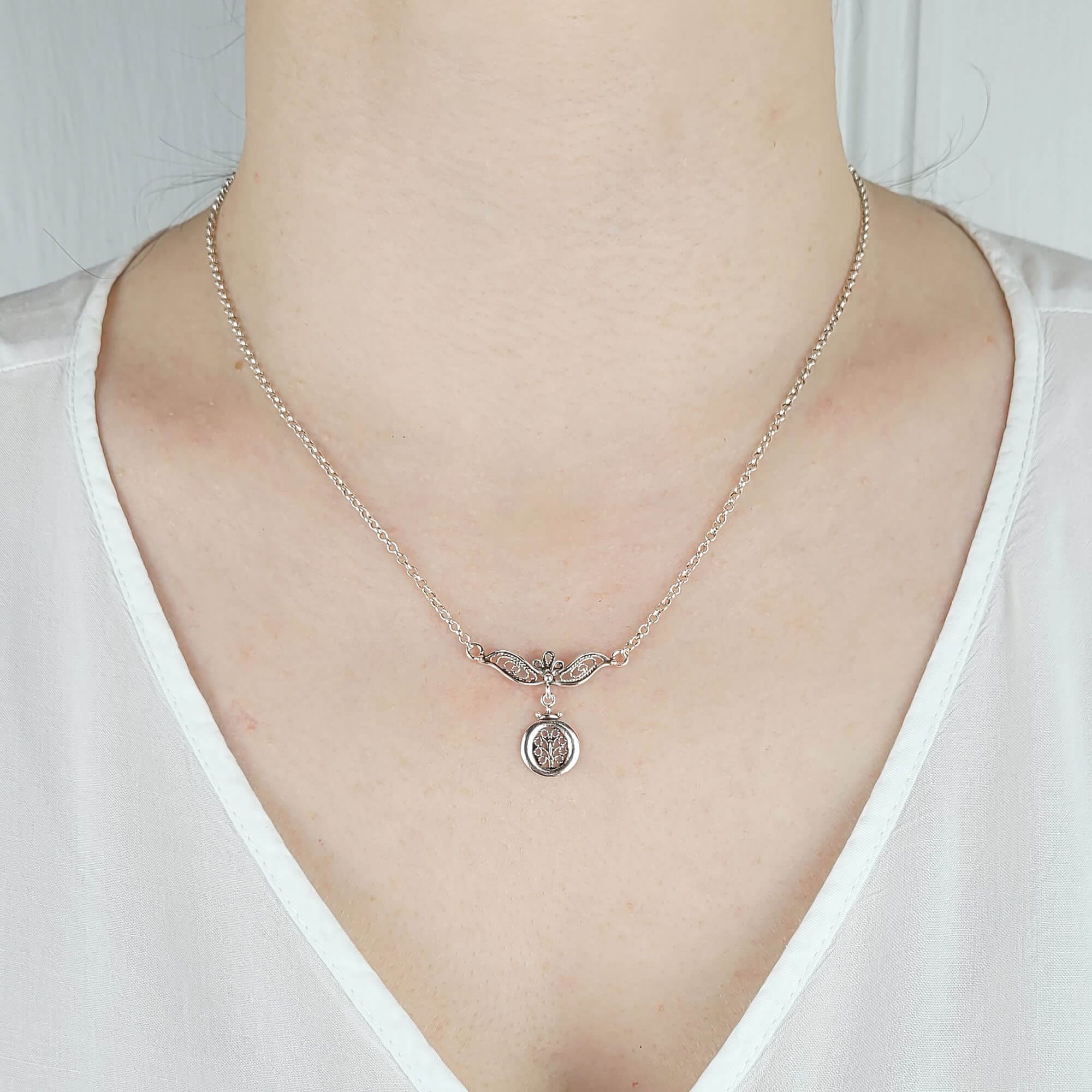 Elegant 925 sterling silver choker necklace featuring a filigree art tree of life pendant, showcasing intricate craftsmanship and design.